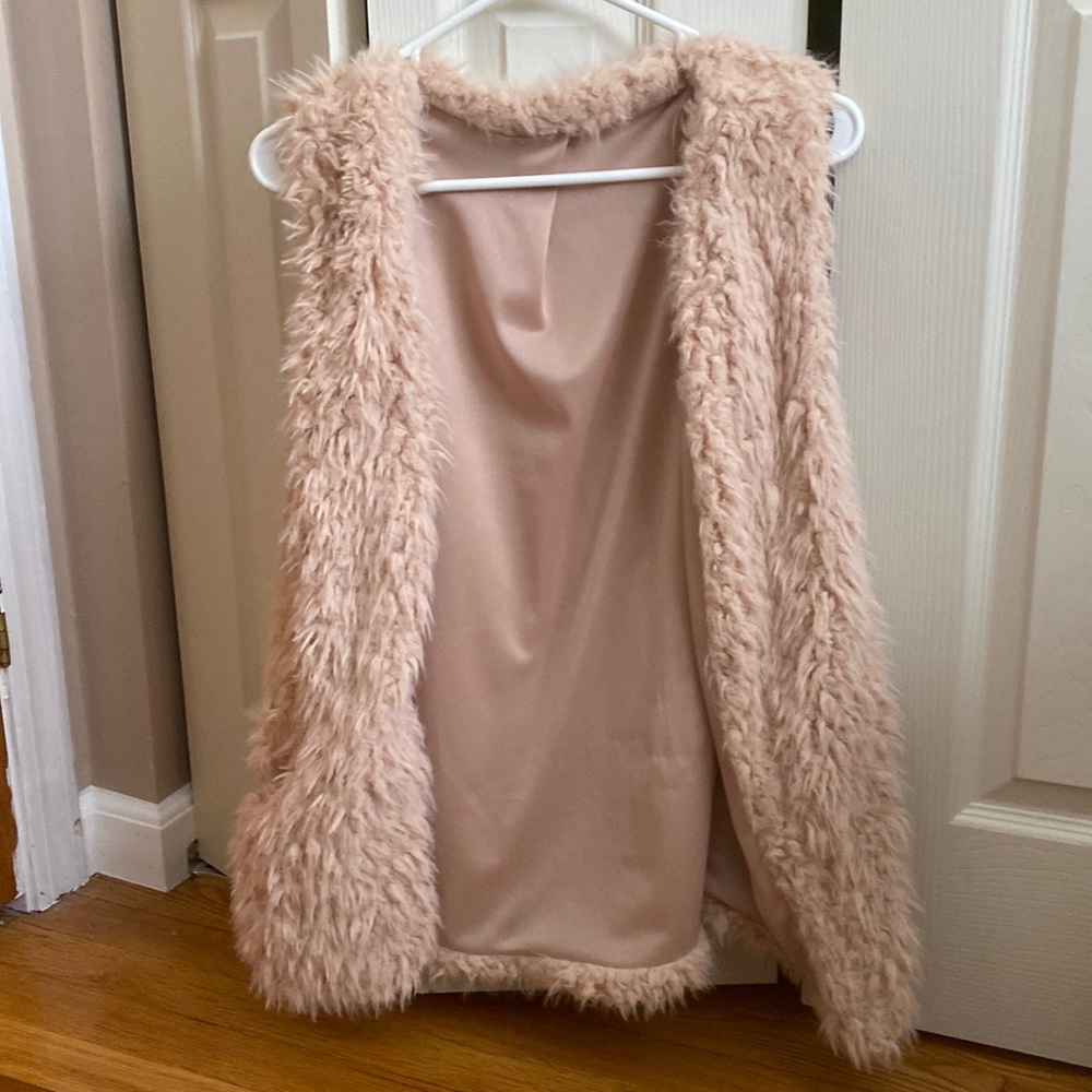 Blush colored Sherpa vest